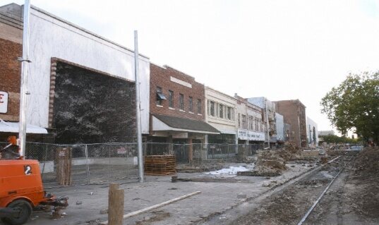 K Street during light-rail construction, with vacant storefronts
