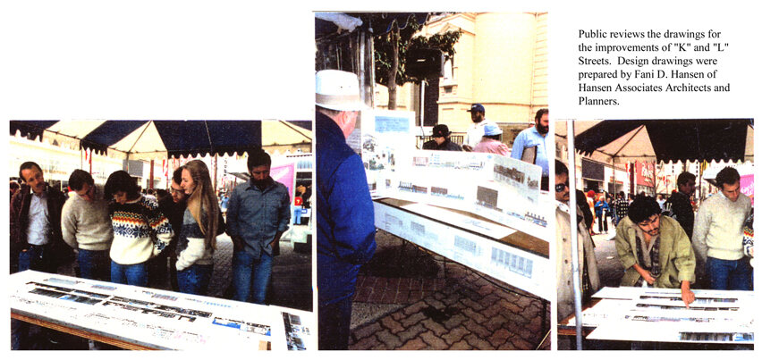 The public reviewing design drawings displayed on K Street