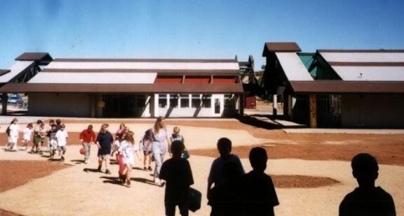 Students walking toward the classroom buildings