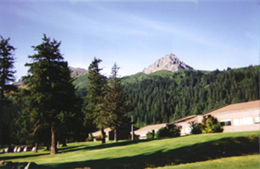 The school site with the mountains of Seward behind